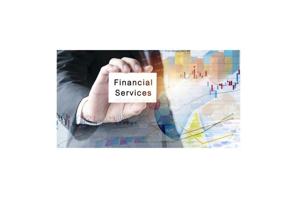 a man holding a sign that says financial services