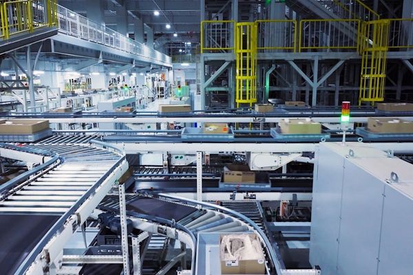 a factory filled with lots of machines and boxes
