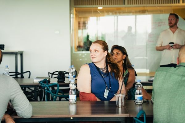 People attending a presentation in a modern office