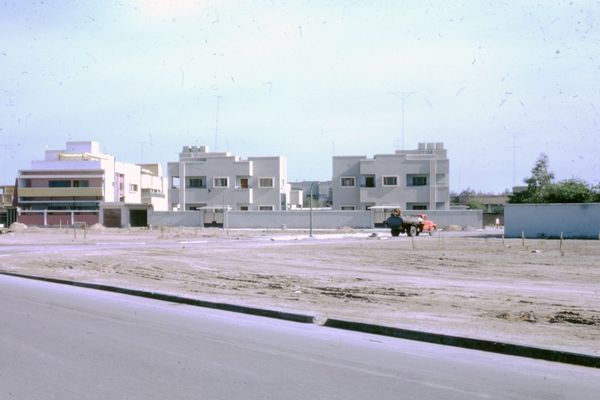 white concrete building near road during daytime