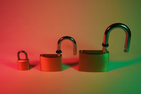 two green and silver padlock
