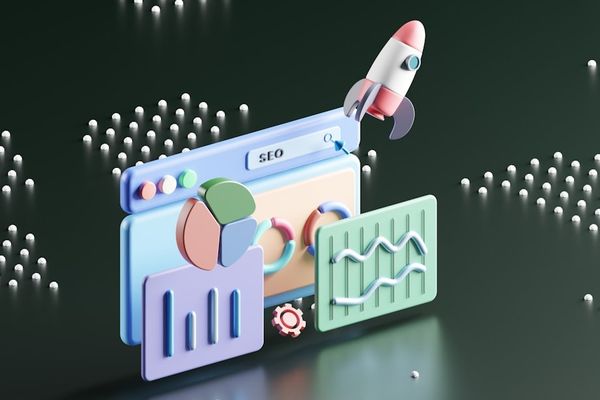 a computer screen with a rocket on top of it