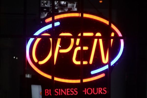 a lighted sign with a word on it