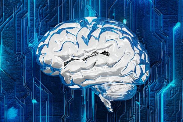 A computer circuit board with a brain on it