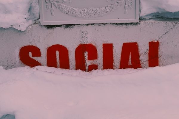 red and white love print on white wall