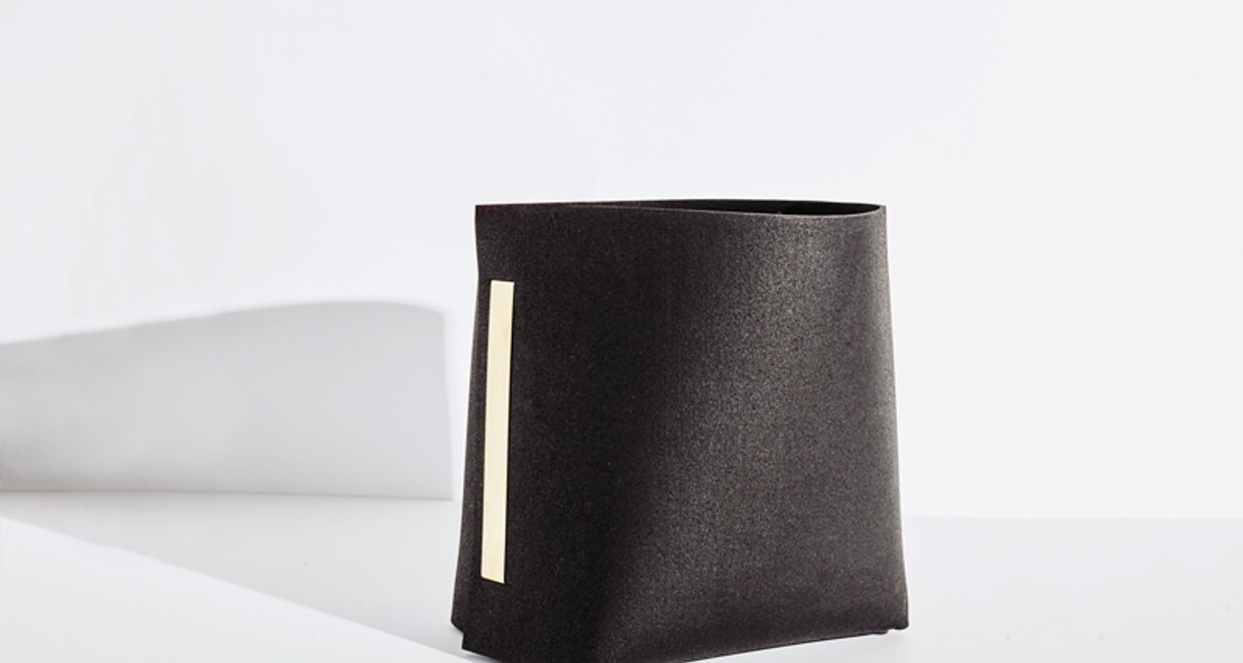 Rubber and Brass Bin by Slash Objects