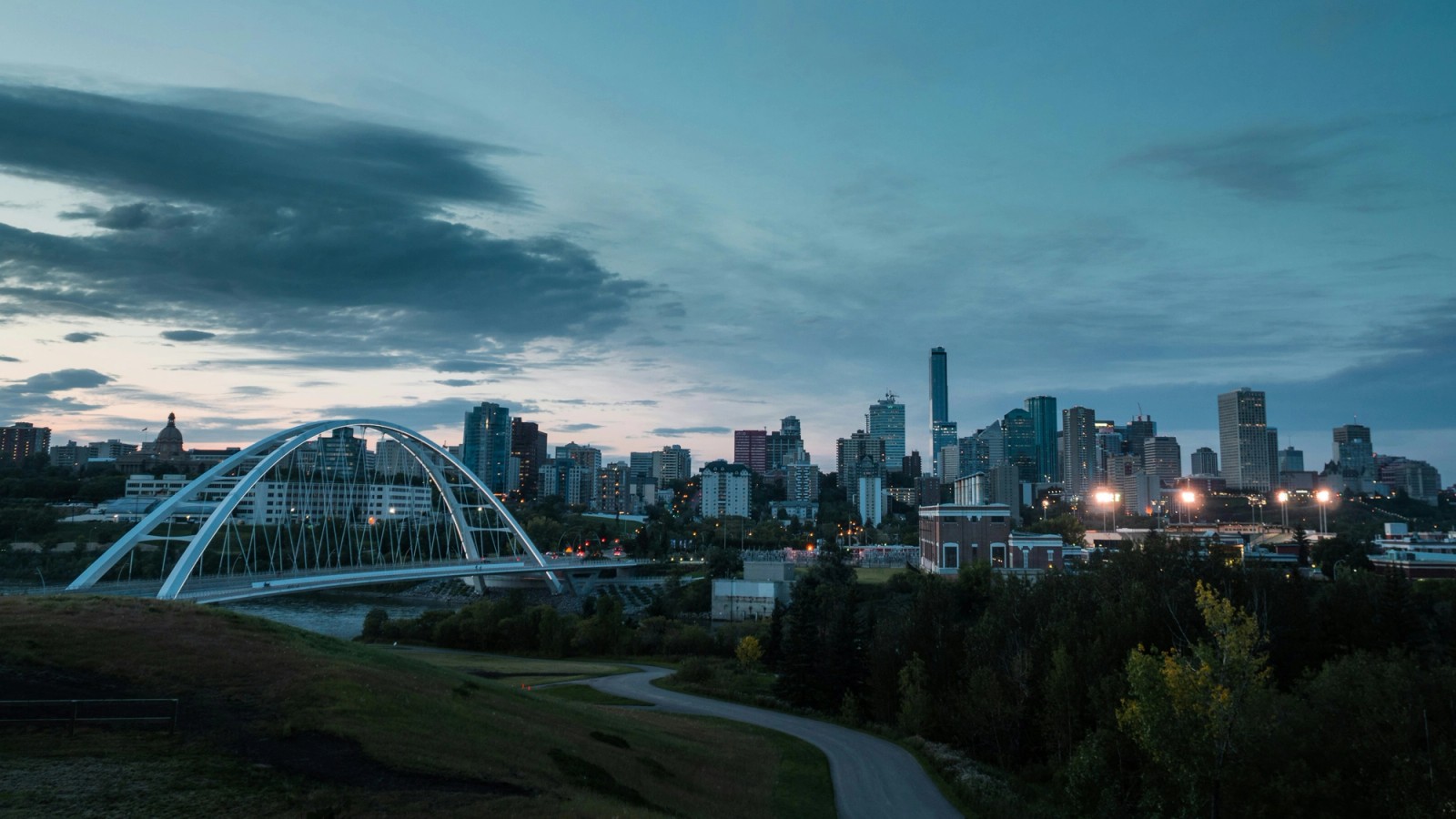 Edmonton skyline and a bridge across the river at dusk