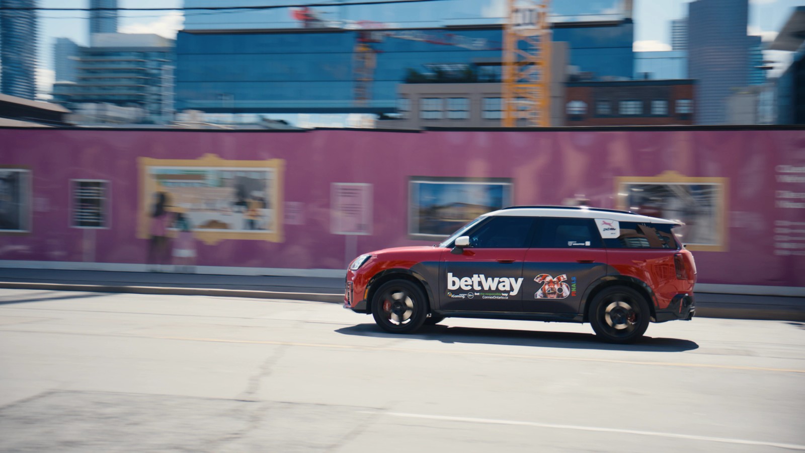 Betway wrapped red SUV travelling through Toronto