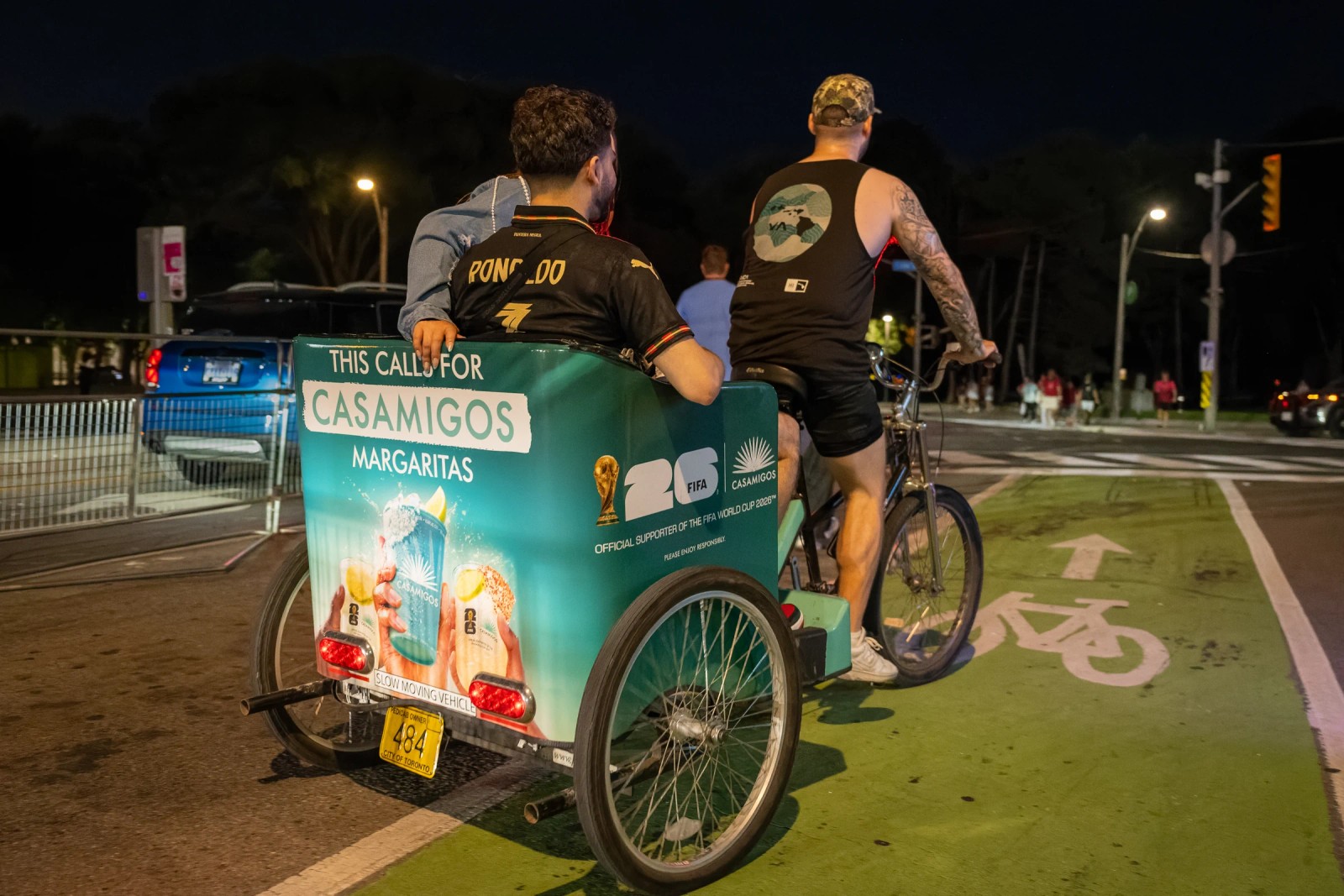 Casamigos branded pedicab carrying matchday fans