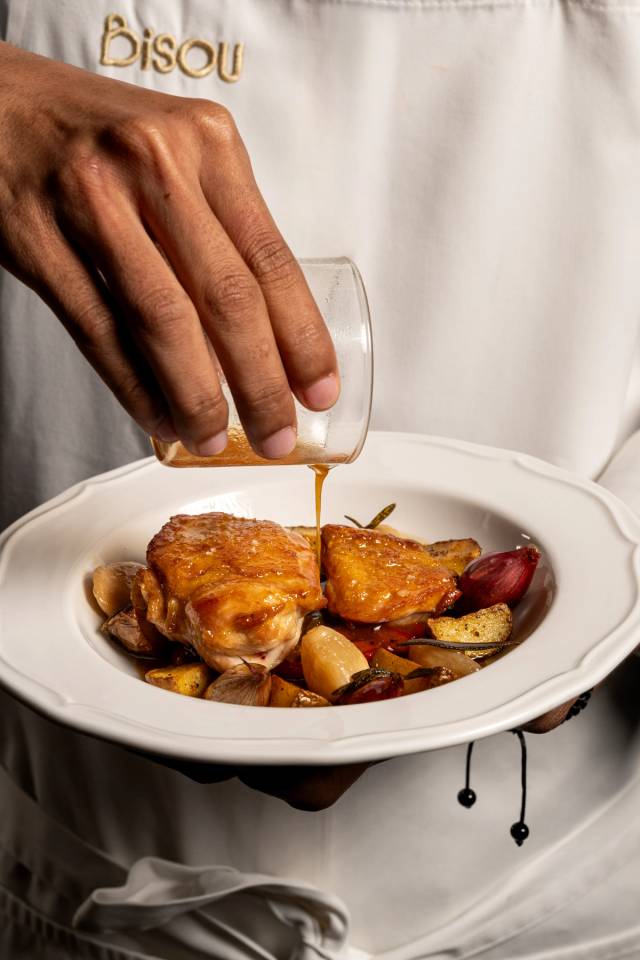 Provencal chicken, supreme sauce, basquaise condiment