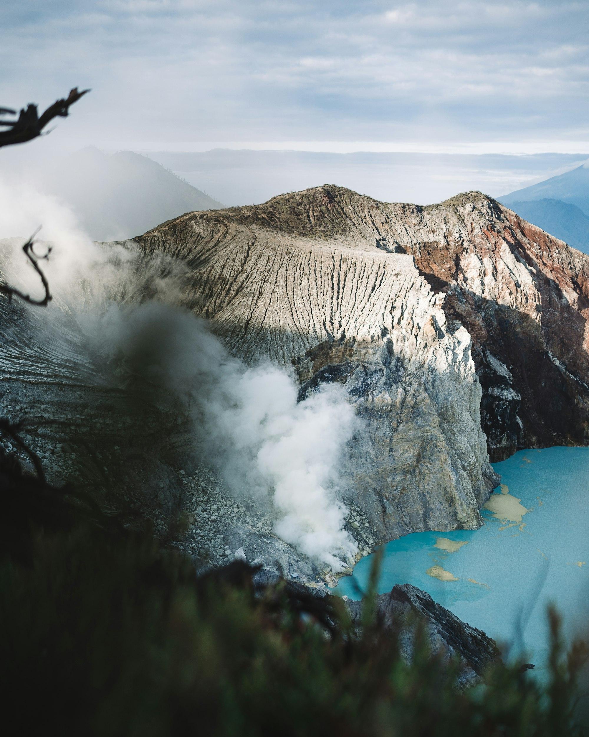 Asap belerang mengepul dari dinding kawah Ijen