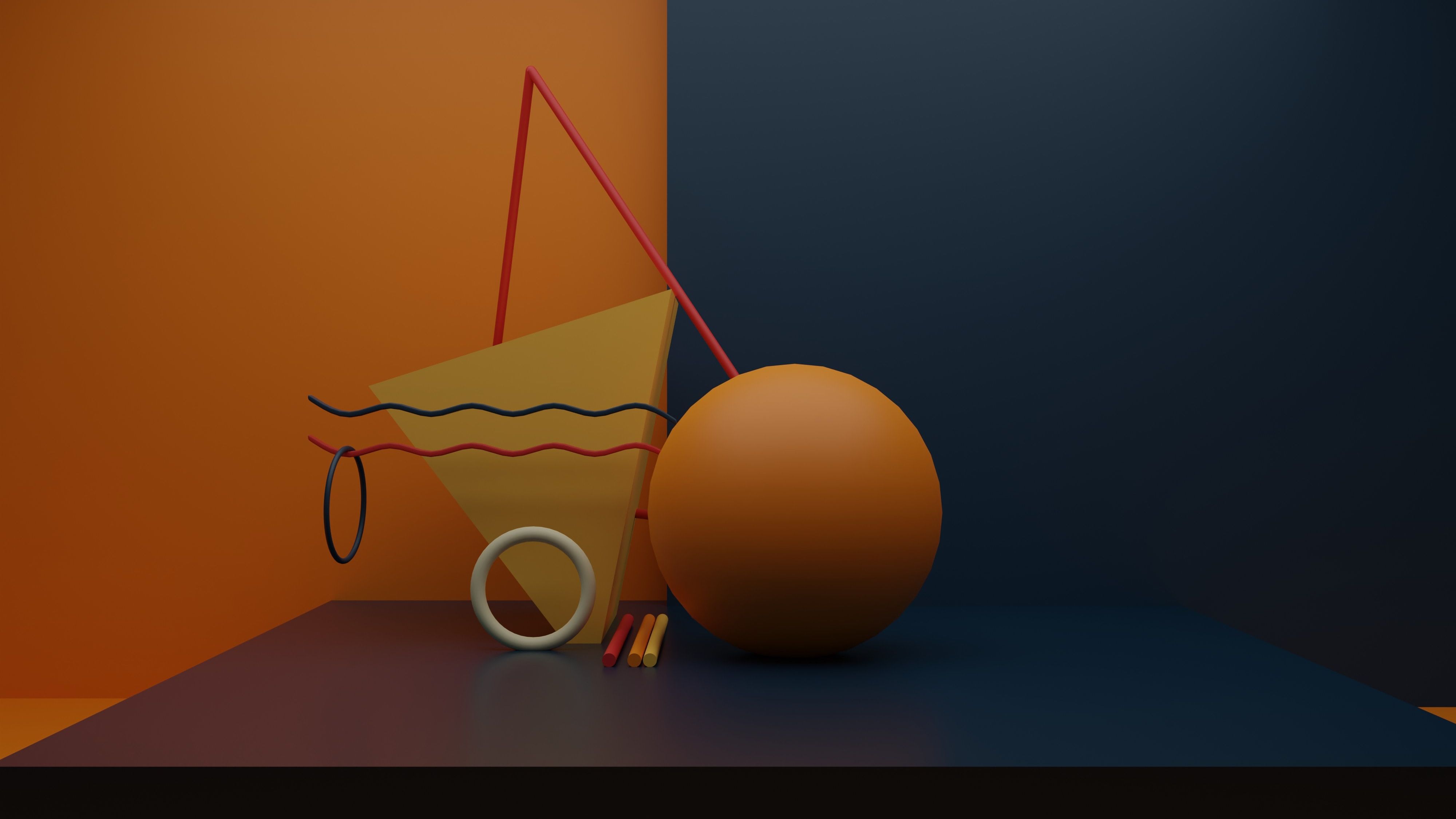 A 3D image of a stage with a orange and dark navy background with a ball, triangle, lines and rings on the stage