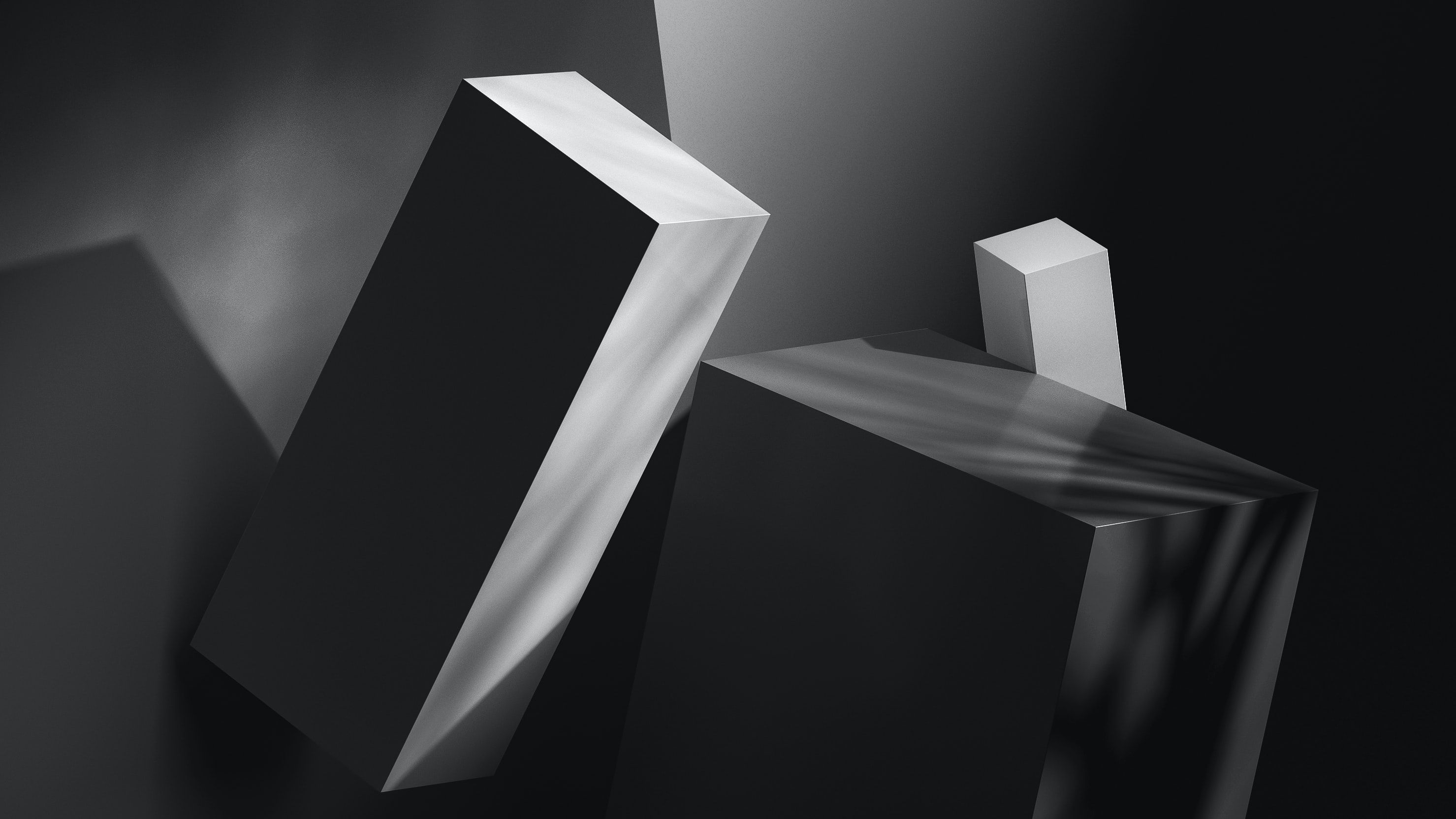 Black and white 3D rectangular blocks of different sizes