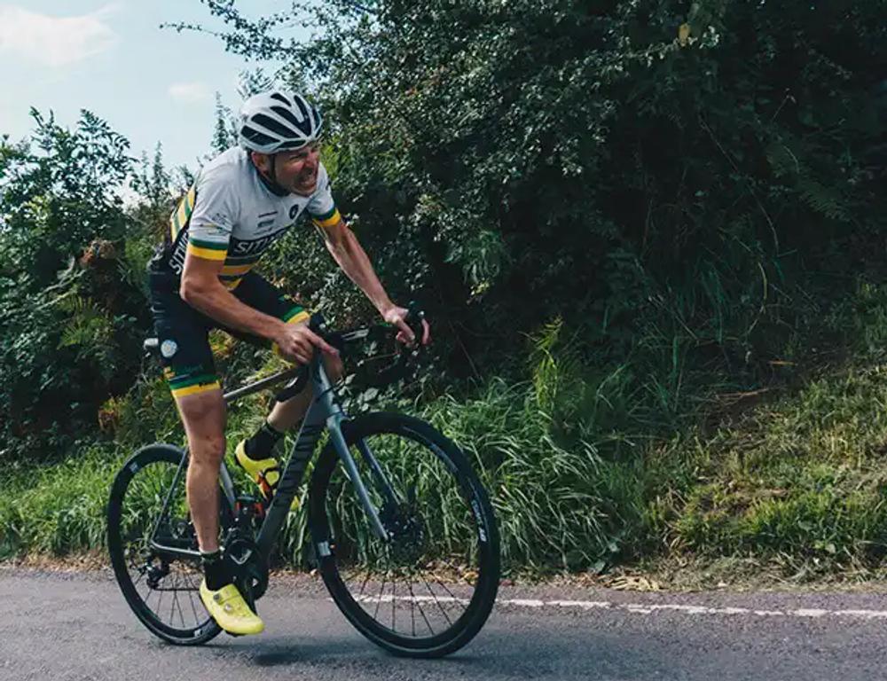 A photograph of Club member Joe Srike racing up Ulley Lane