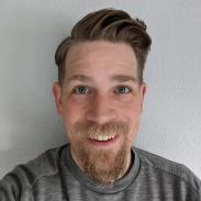 A portrait photograph of Jonny Haynes