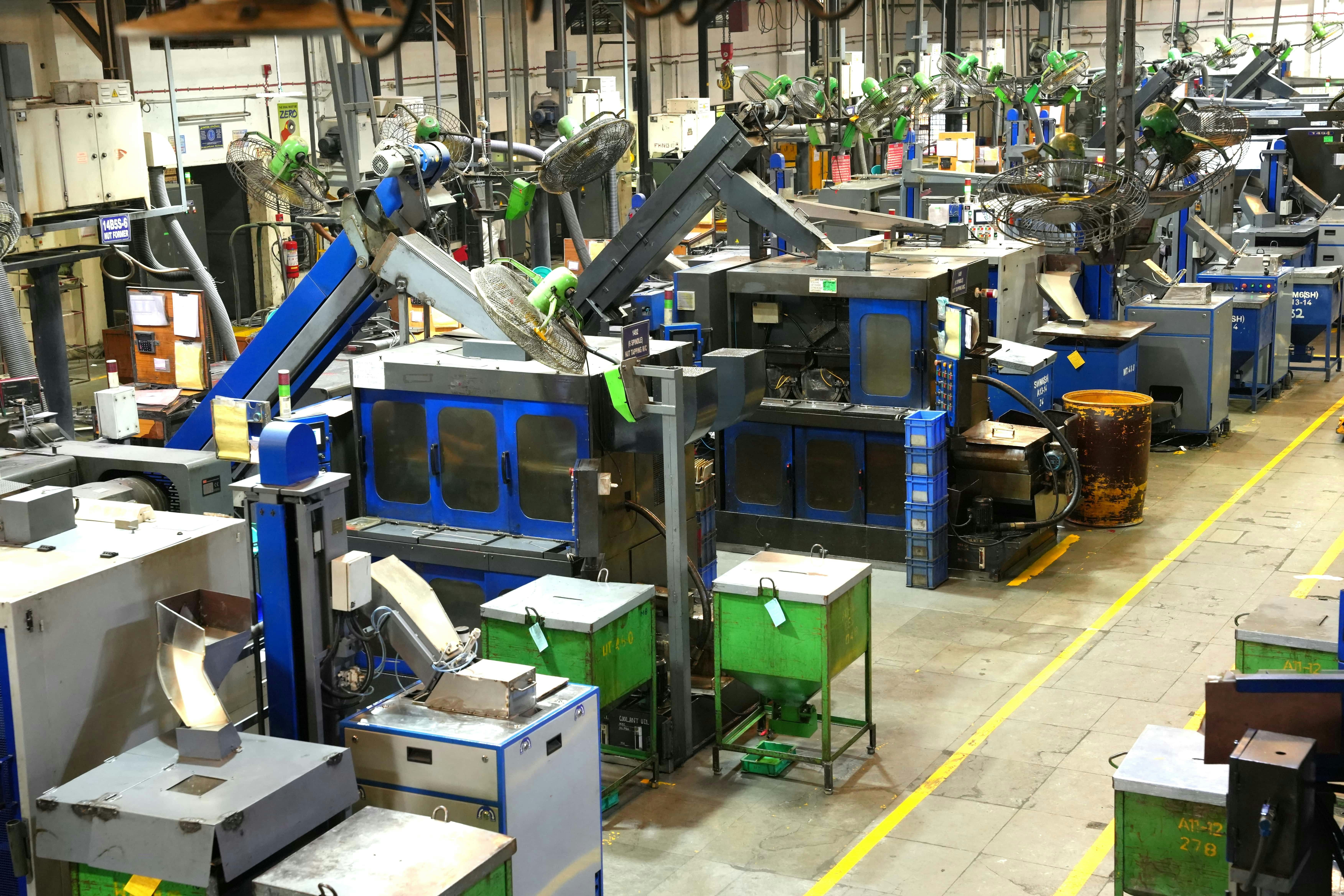 Manufacturing growth slows as inflation pressures intensify