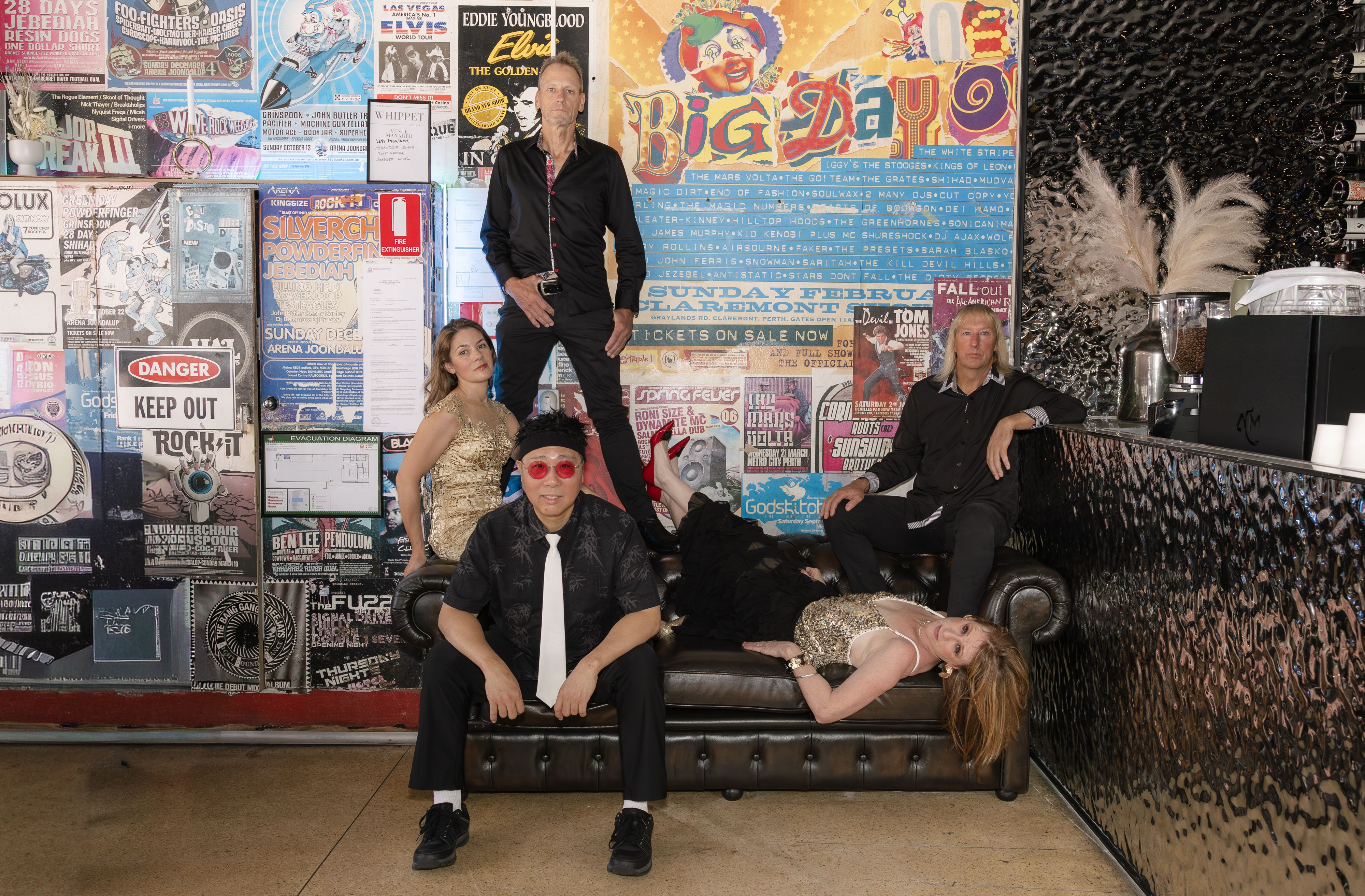 band photo pose on couch