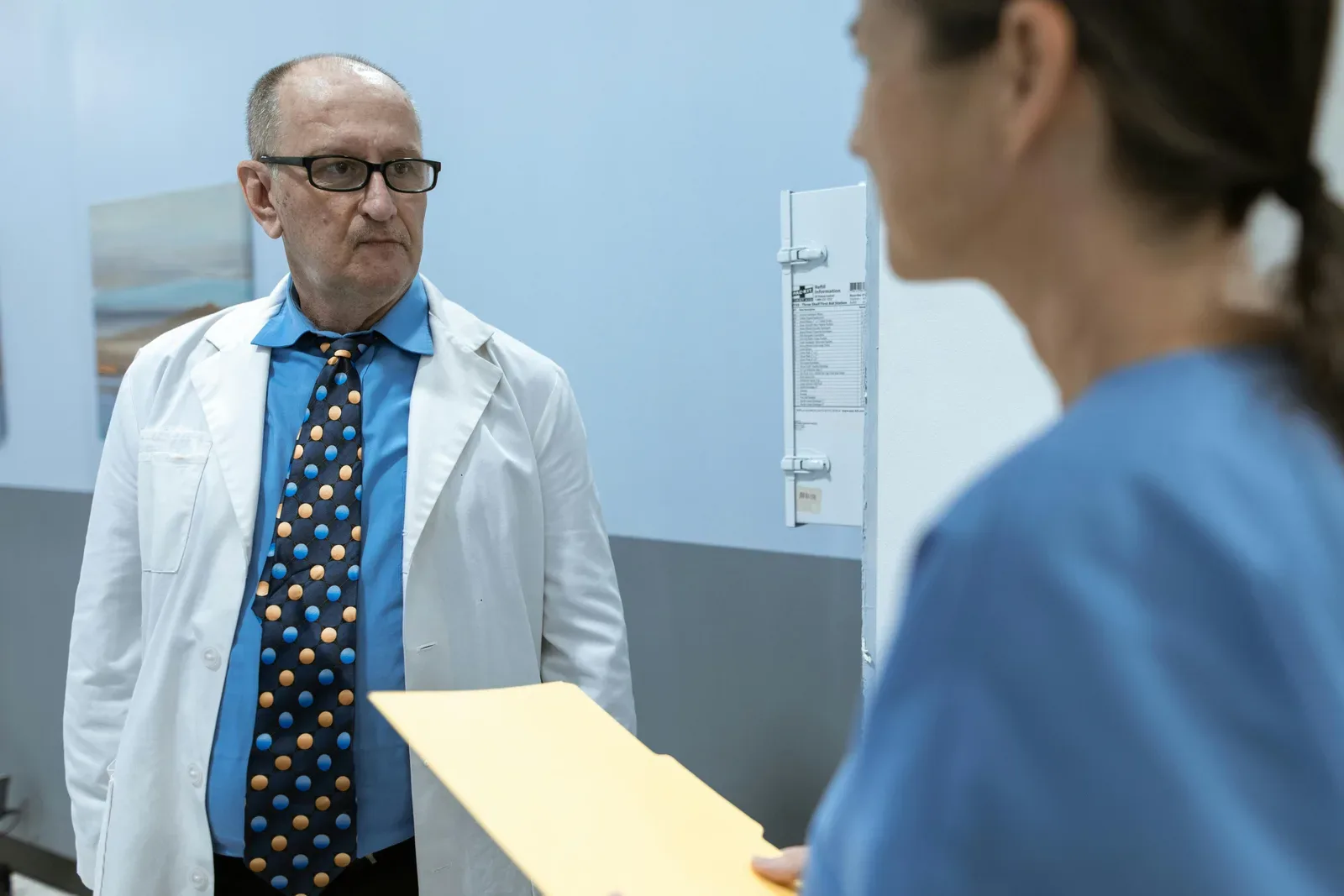 Doctors discussing at a medical clinic. Healthcare team collaboration.