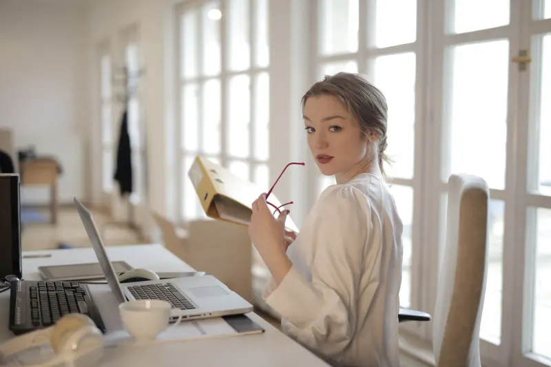 Person taking a break from a computer because of eye discomfort