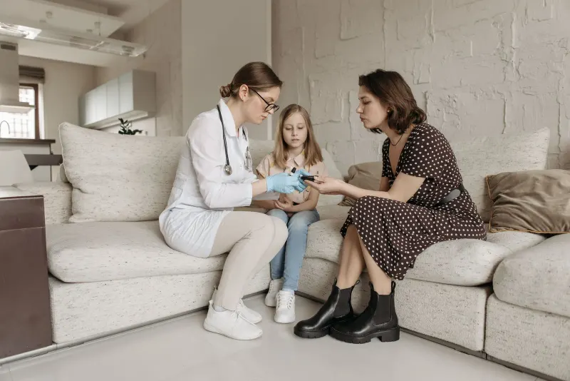 Child attending a healthcare visit with a parent