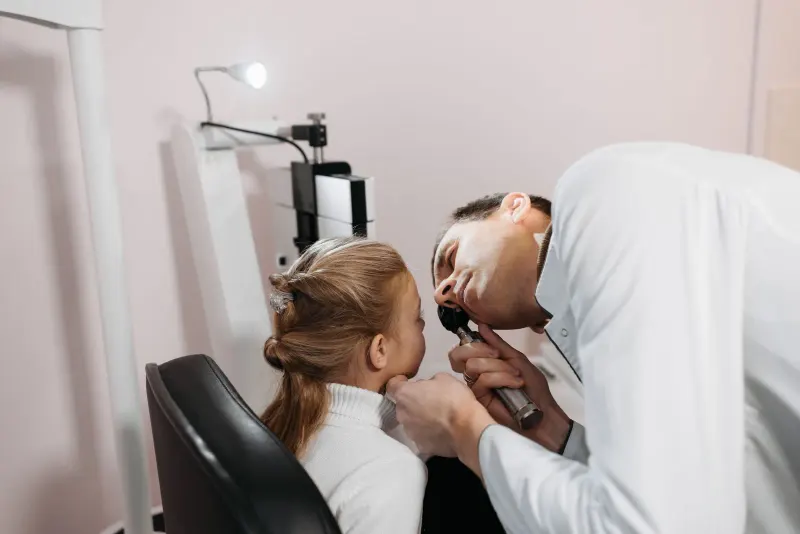 Older adult having an eye examination with a clinician