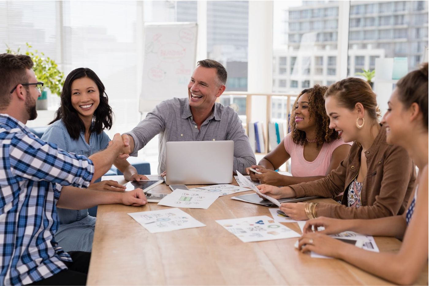 A group of IT professionals working tirelessly to help clients get a strong cybersecurity plan