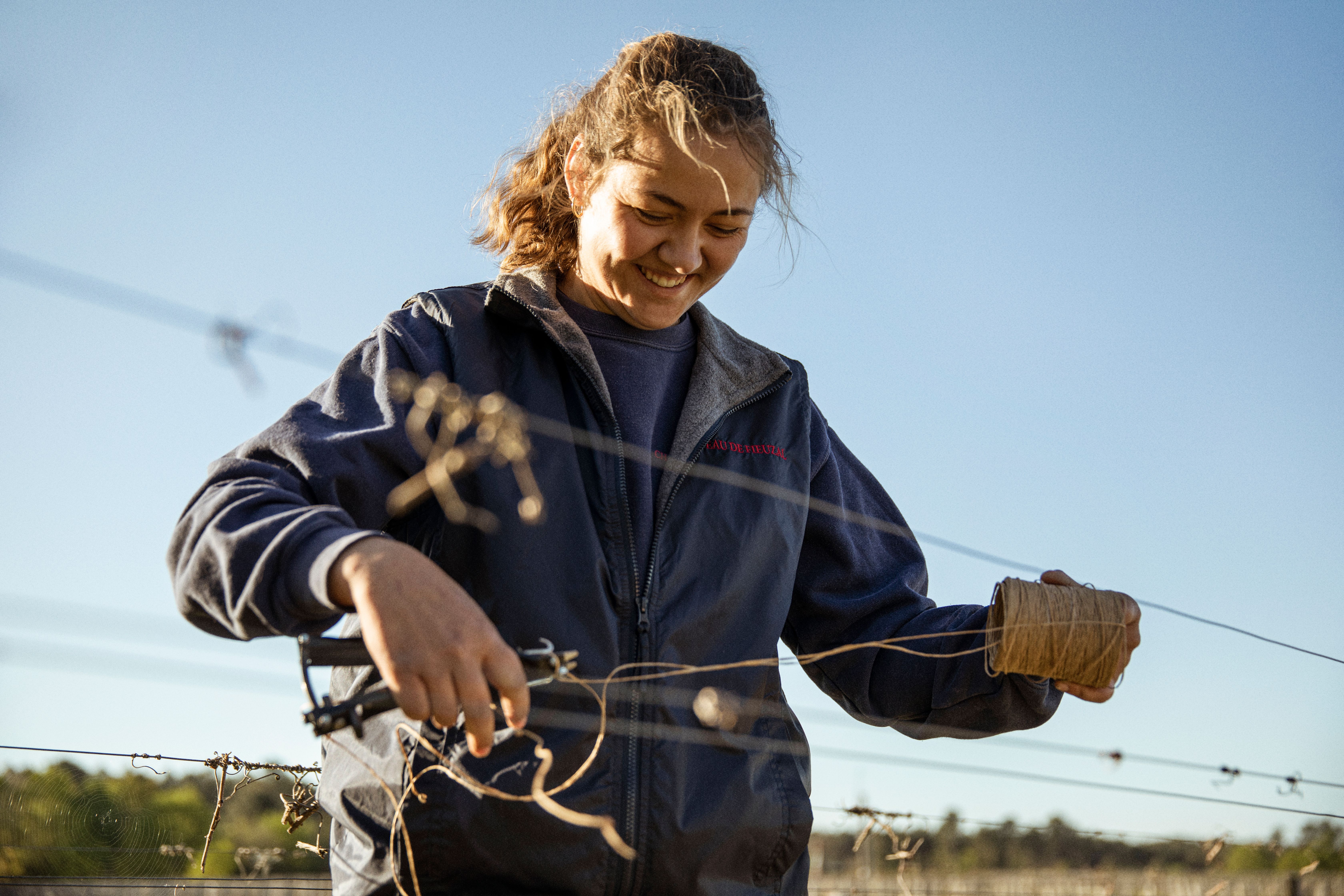 vineyard worker smiling