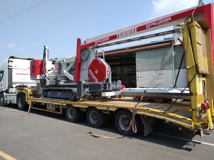 Pellegrini Trimwire mobile tracked diamond wire saw cutting natural stone blocks in a quarry