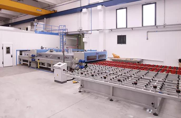 Triulzi laminated glass line, oven press unloading