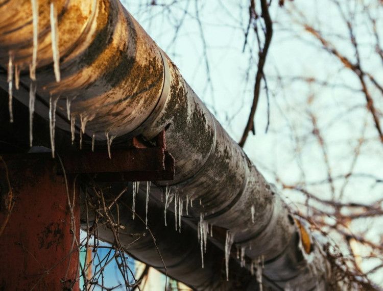 Insulated plumbing pipe during freezing winter weather