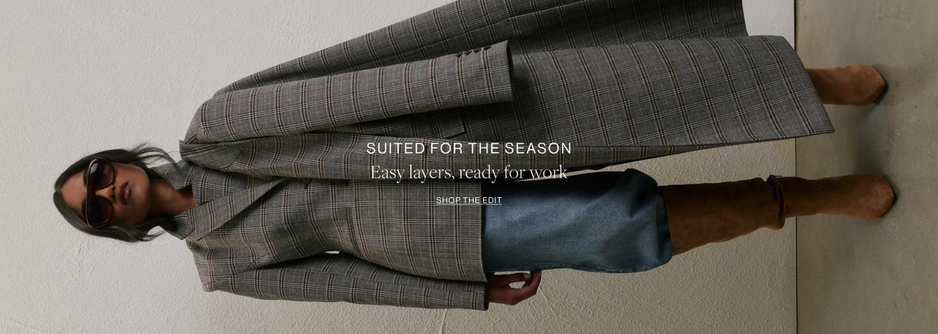Model wearing a grey plaid print blazer and blazer coat. Text overlay: "SUITED FOR THE SEASON. Easy layers, ready fork work"