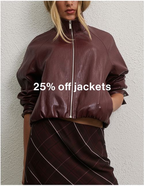 Model wearing a burgundy cropped jacket and skirt set, promoting 25% off jackets.