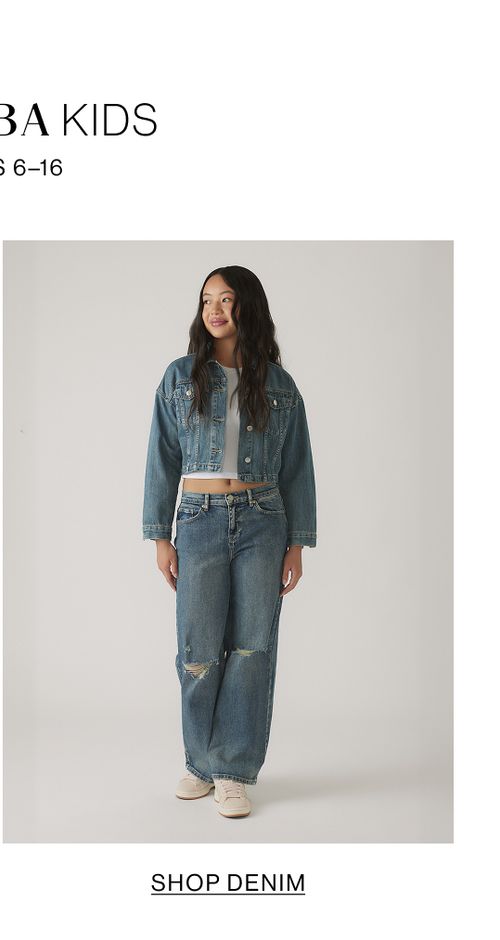 Girl wearing denim on denim with text that states "Shop Denim"