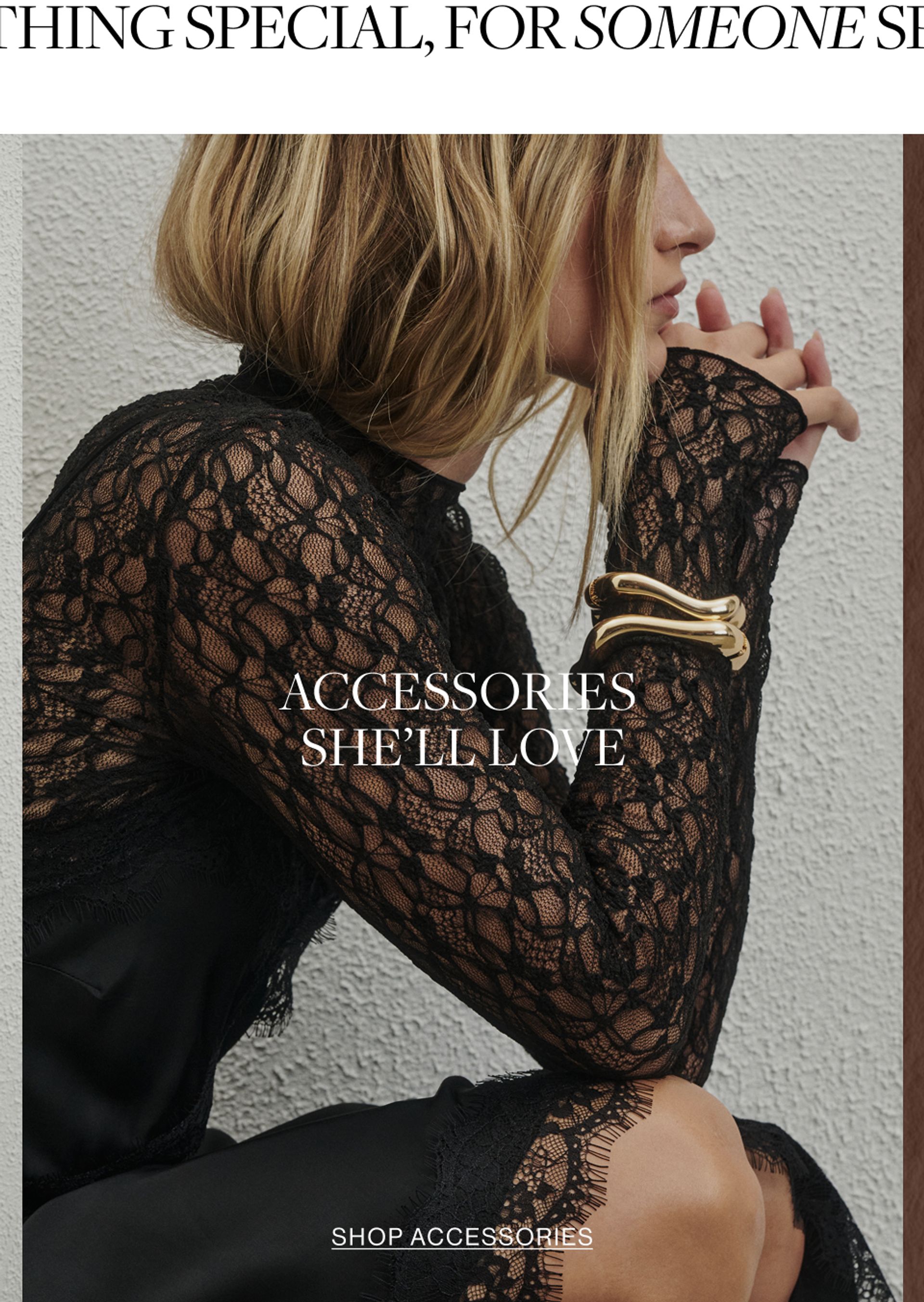 Close up shot of model wearing a black lace long sleeve top with a gold bangle with text overlay: "ACCESSORIES SHE'LL LOVE"