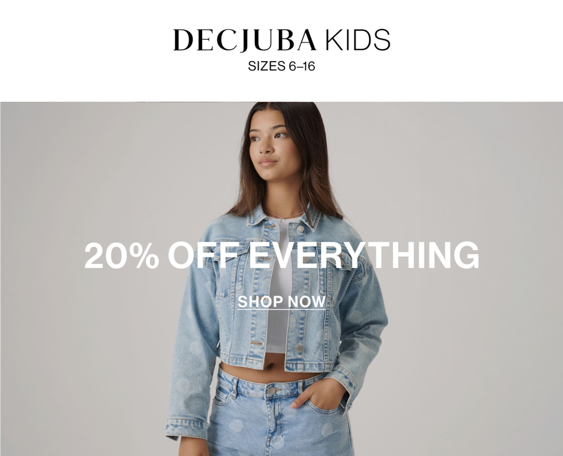 A young girl posing in a denim polka dot set with text overlay: "20% OFF DECJUBA KIDS"