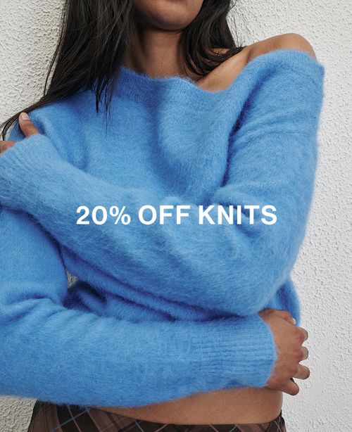 Model wearing a blue knit. Text reads 20% off knits.