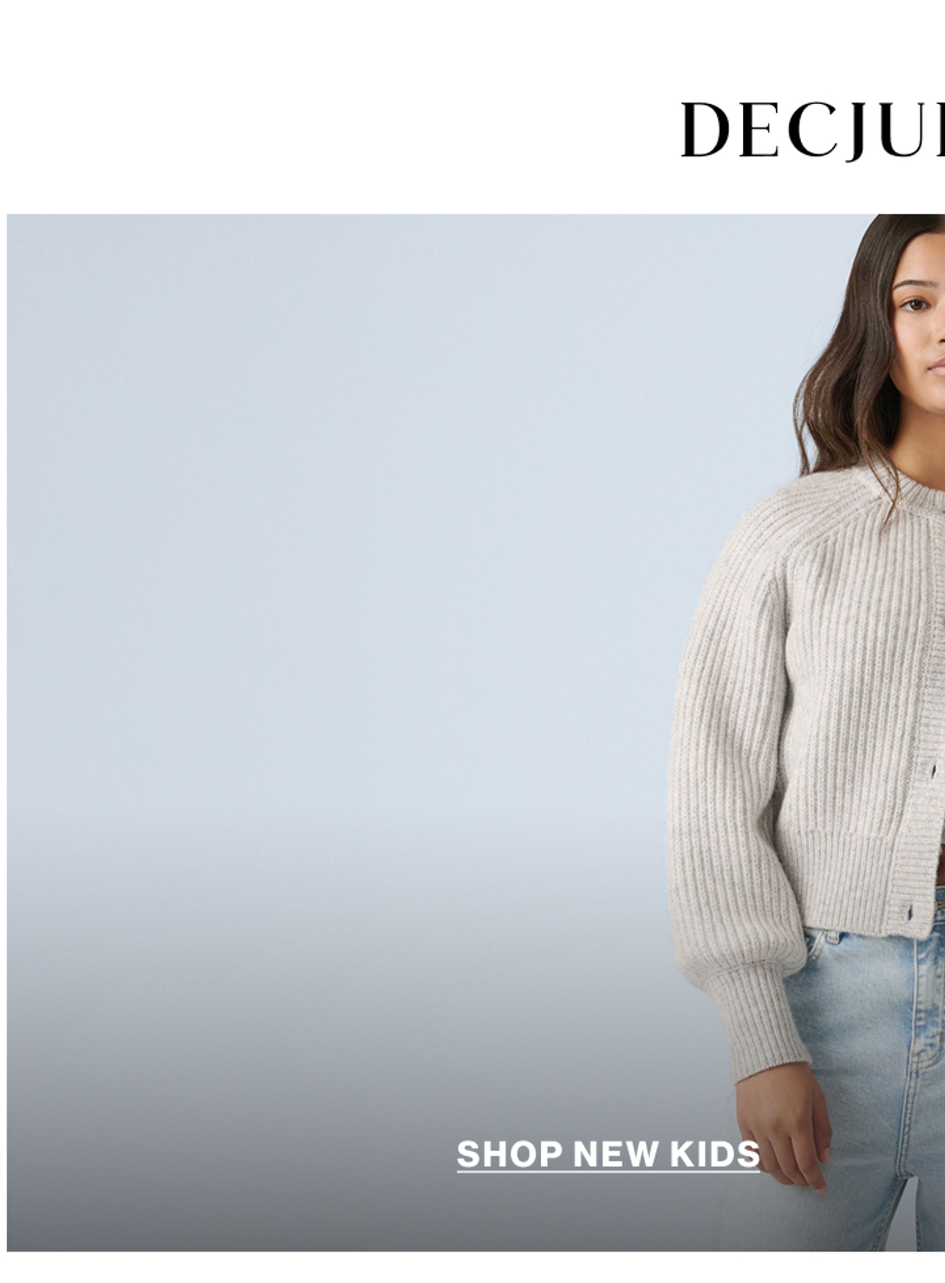 Model wearing a stripe knit in a studio. Text reads DECJUBA KIDS