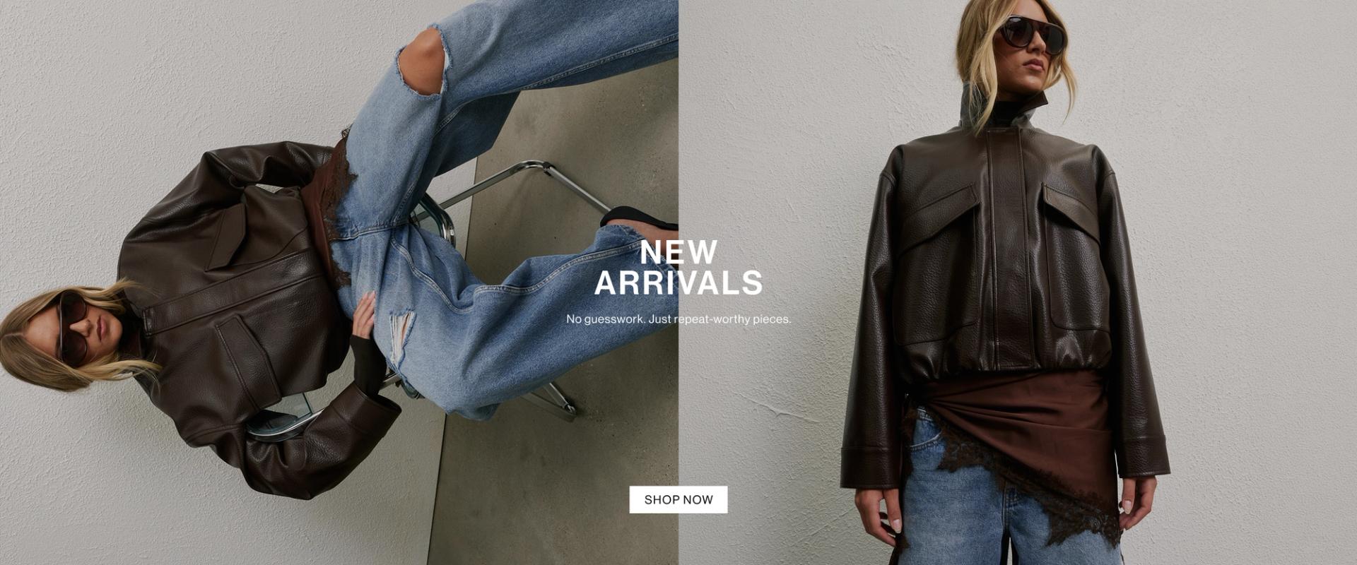 Model in a leather bomber oversized jacket posing against a textured wall – New Arrivals.