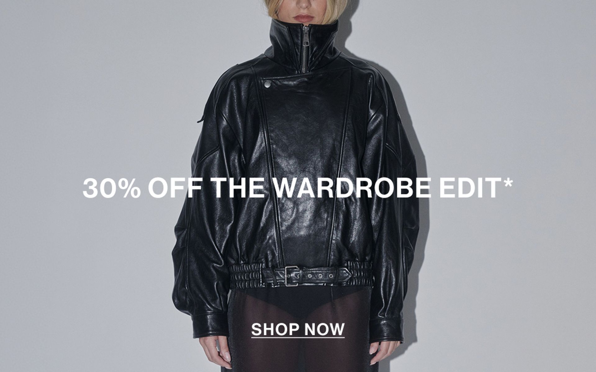 Model wearing a black leather jacket with text overlay: "30% OFF THE WARDROBE EDIT."