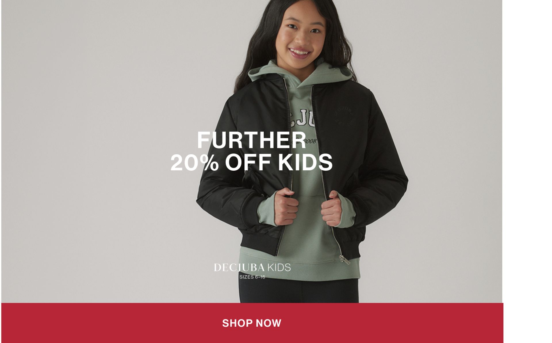 Model wearing a pink sweat set in a studio. Text reads FURTHER 20% OFF KIDS.