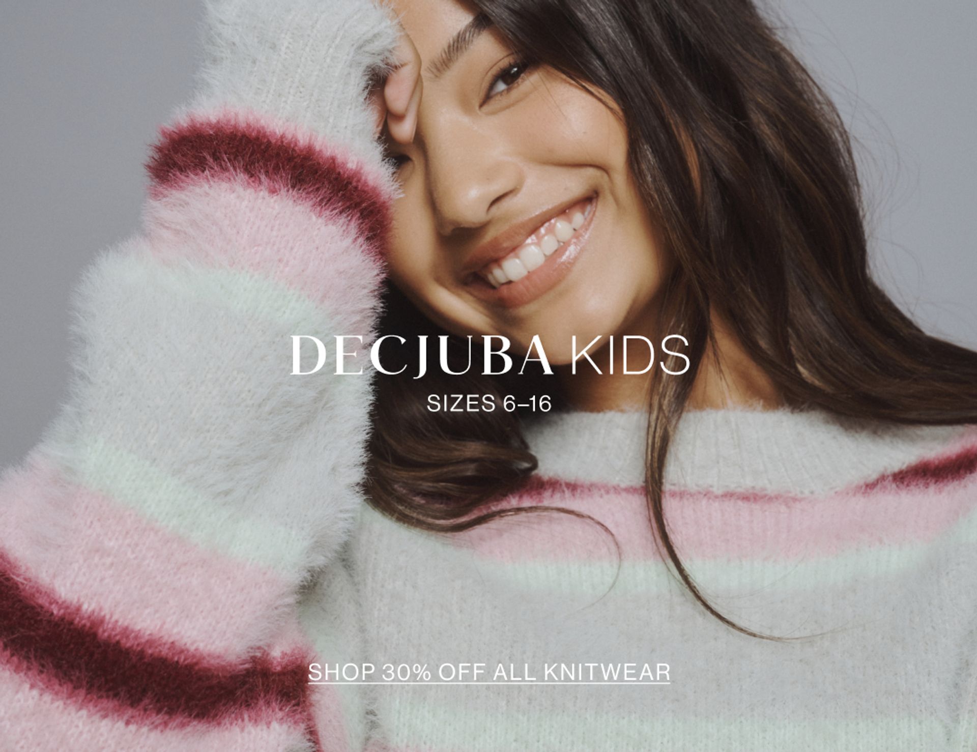 Image of young model wearing a stripe knit with text overlay: "DECJUBA KIDS SIZES 6-16"