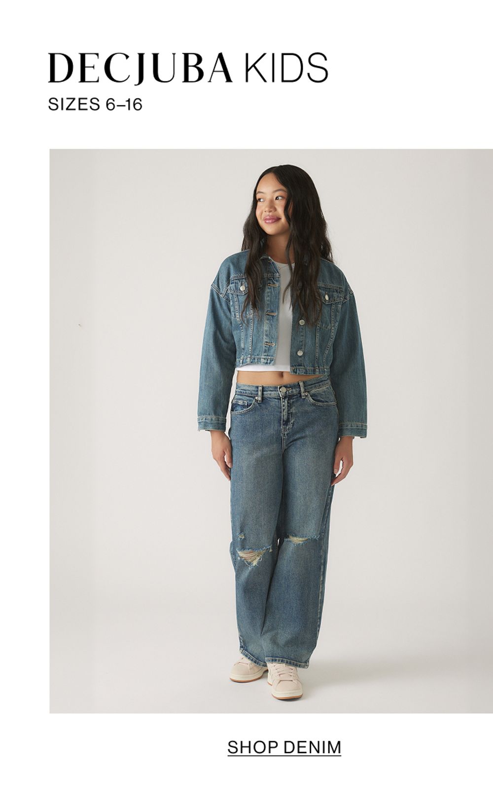 Young model wearing a denim set. SHOP TEEN GIRLS DENIM.