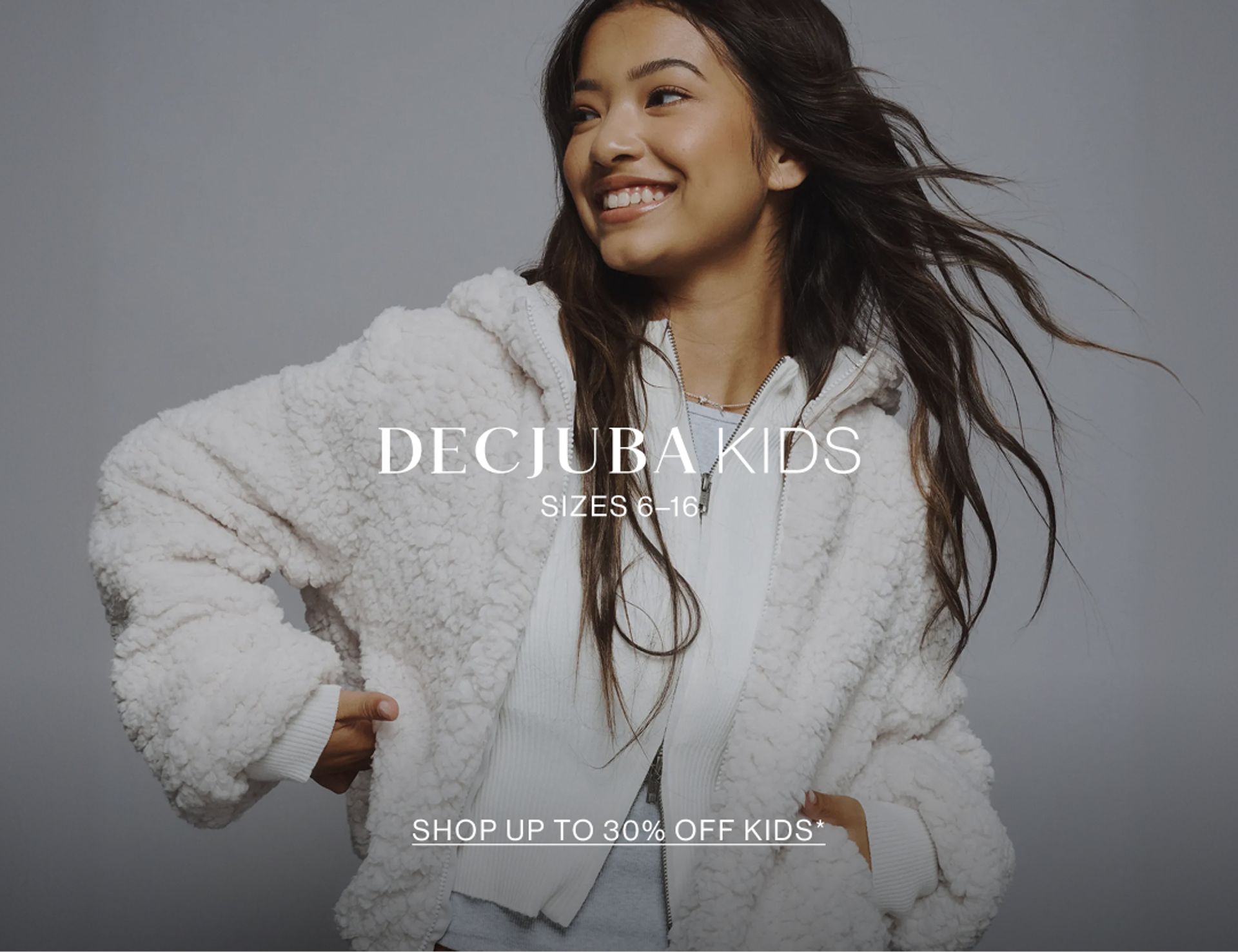 Image of young model wearing a stripe knit with text overlay: "DECJUBA KIDS SIZES 6-16"