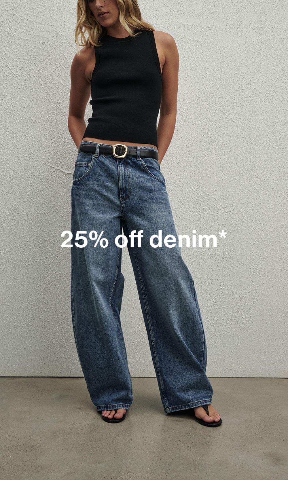 Woman in jeans with promo message