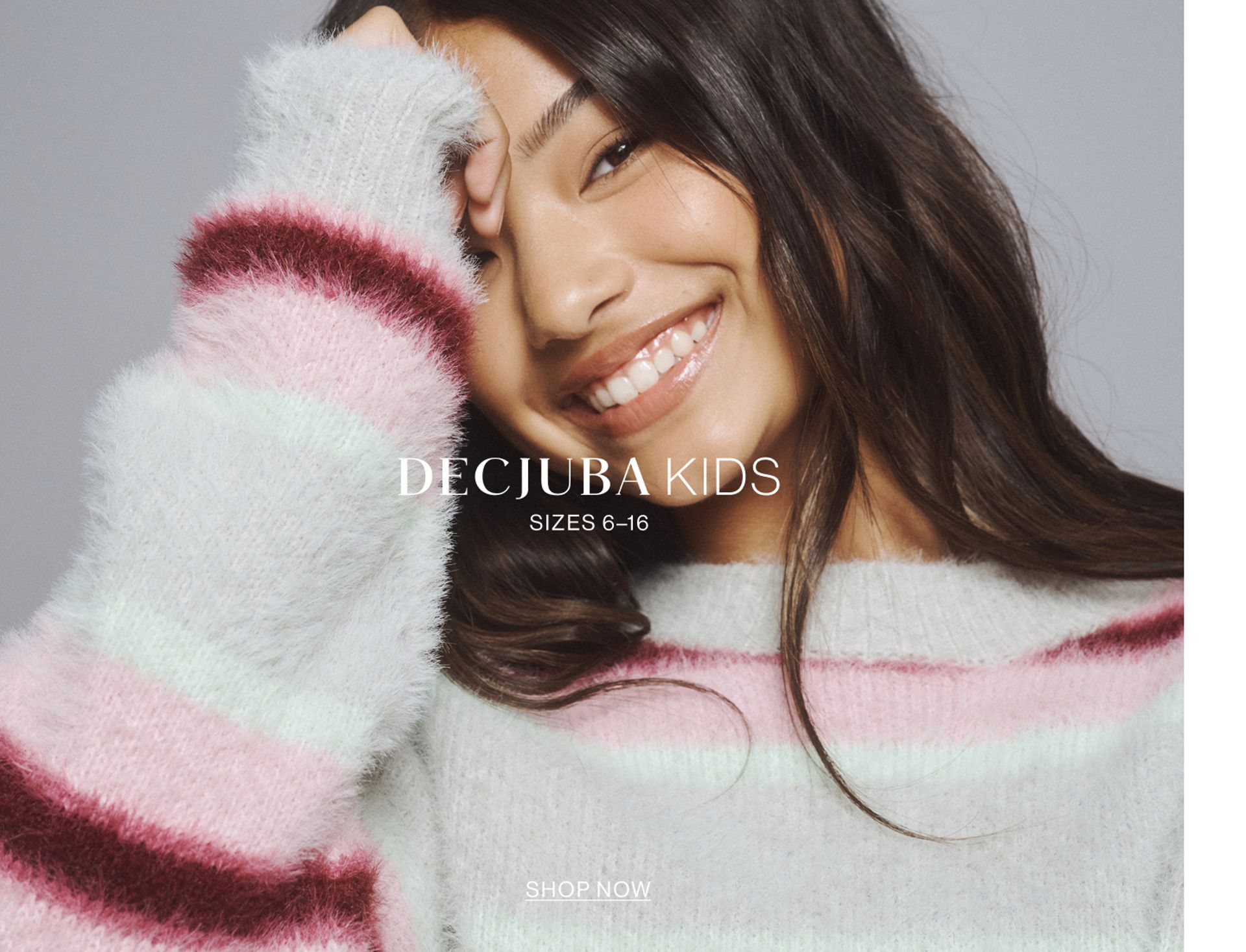 Image of young model wearing a stripe knit with text overlay: "DECJUBA KIDS SIZES 6-16"