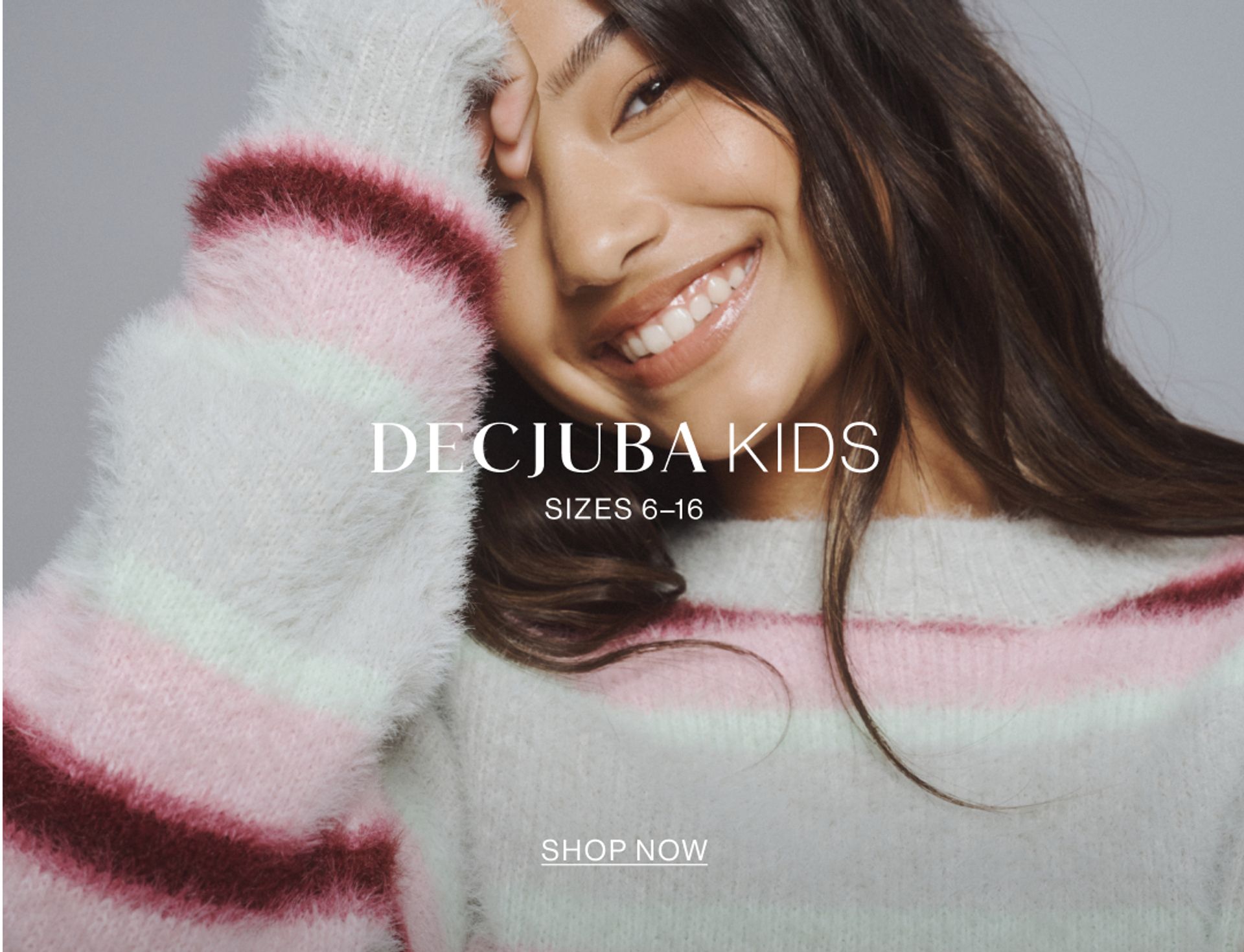 Image of young model wearing a stripe knit with text overlay: "DECJUBA KIDS SIZES 6-16"