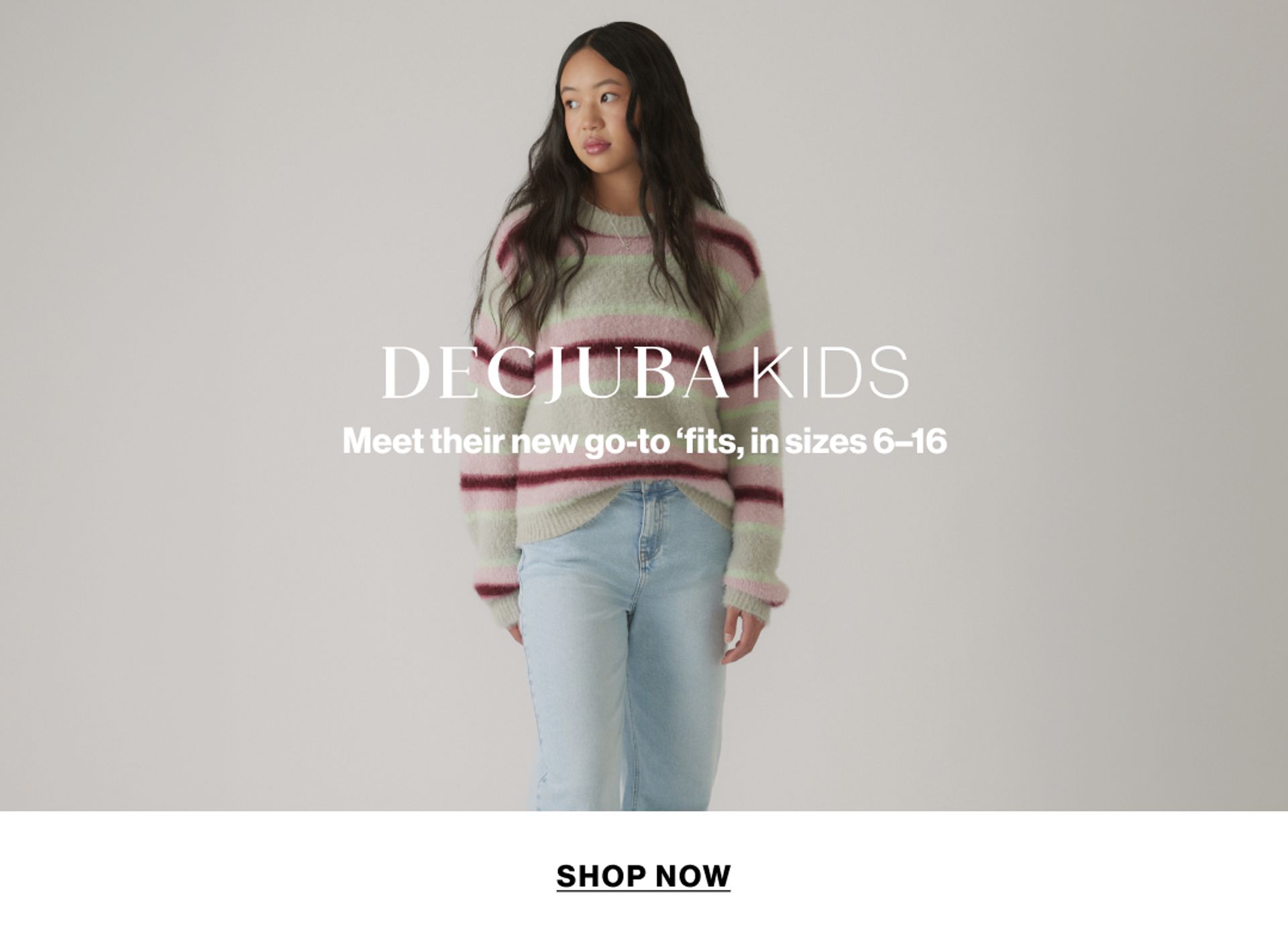 Model wearing a stripe knit in a studio. Text reads DECJUBA KIDS