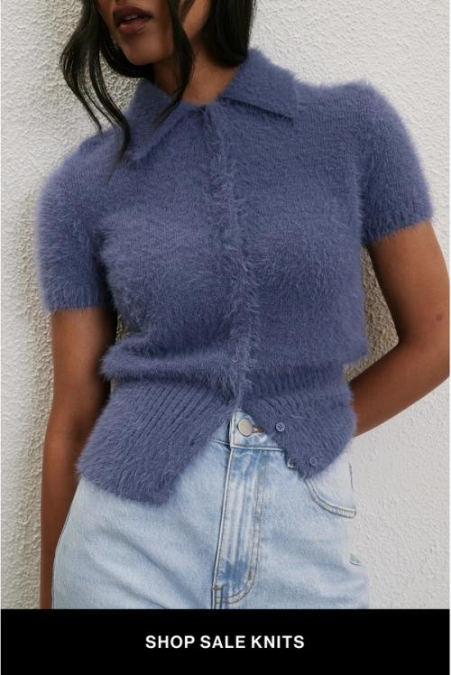 Woman wearing a blue knit jumper with text overlay "further 30% off knits"