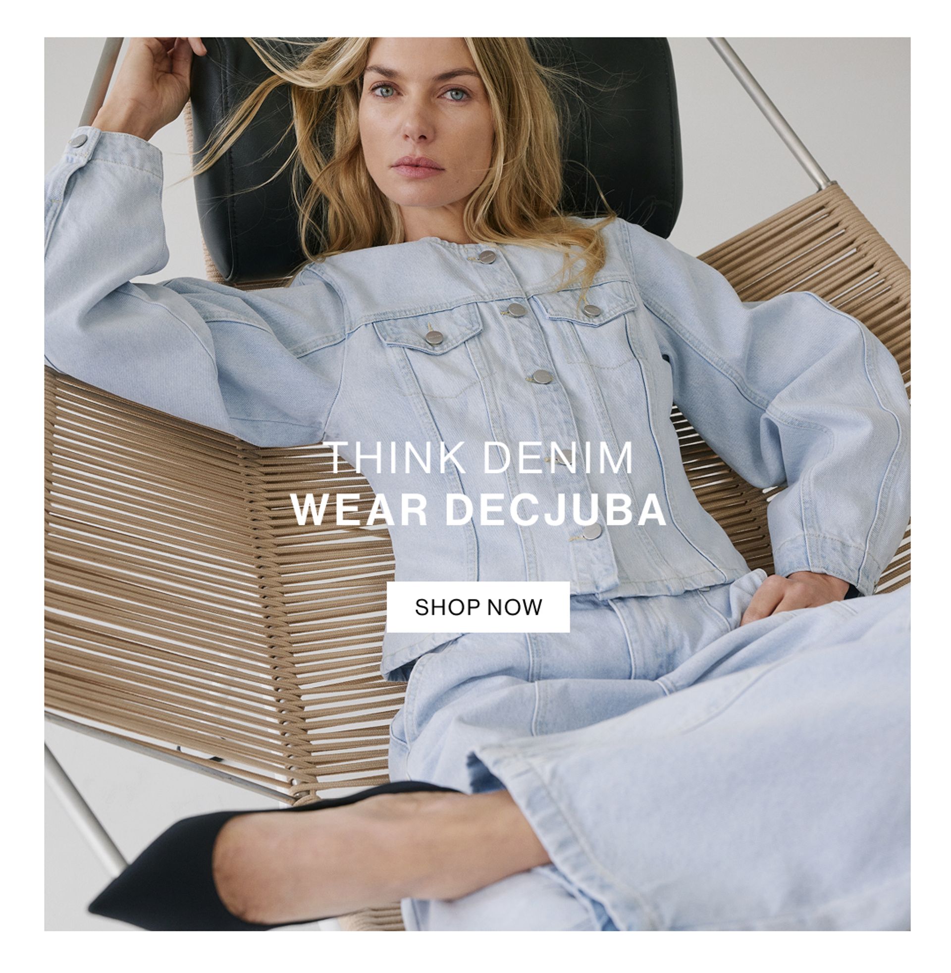Woman staring at the camera laying in a modern chair wearing a matching denim set. Text reads 'think denim wear decjuba'