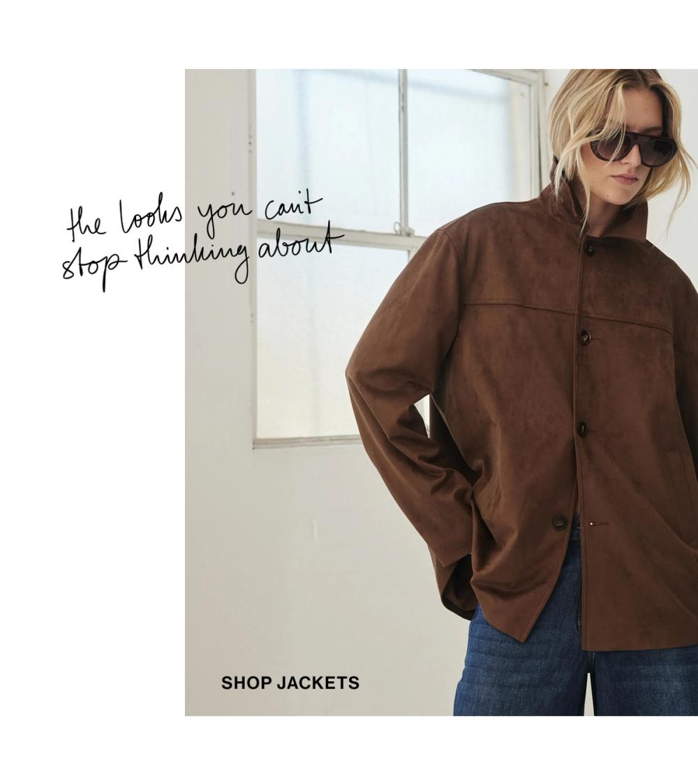Woman standing in a brown suede jacket